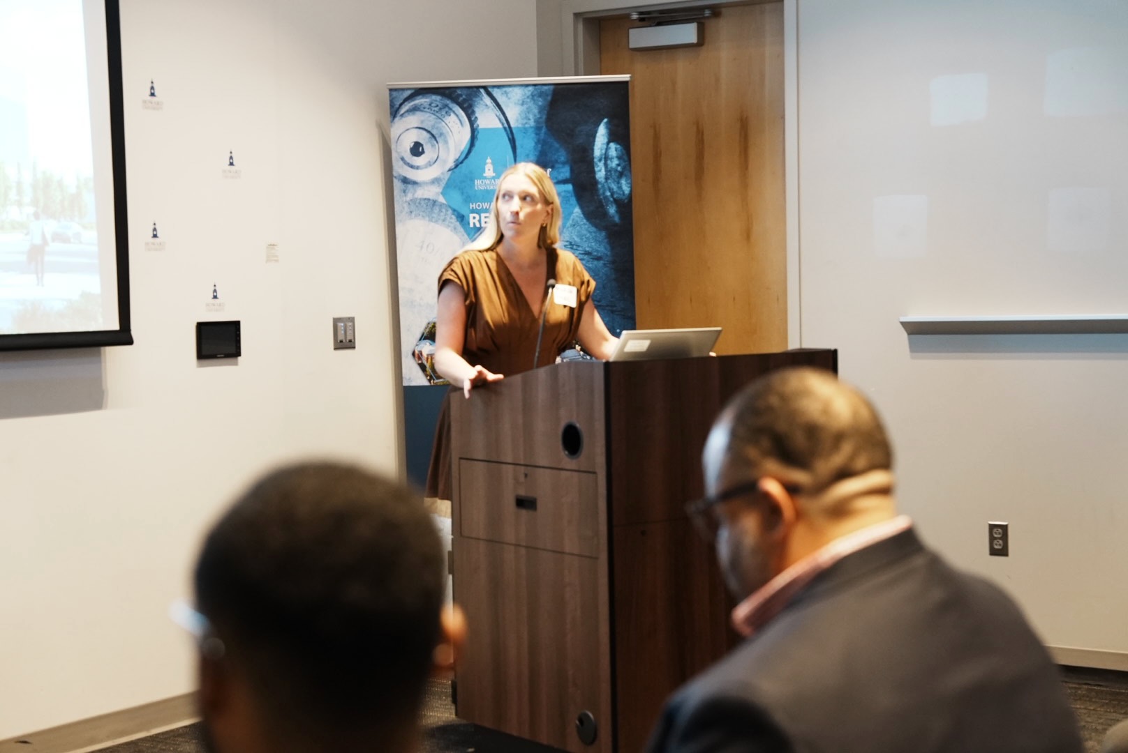 Madison Haas welcomes attendees to the Howard Hospital outreach program
