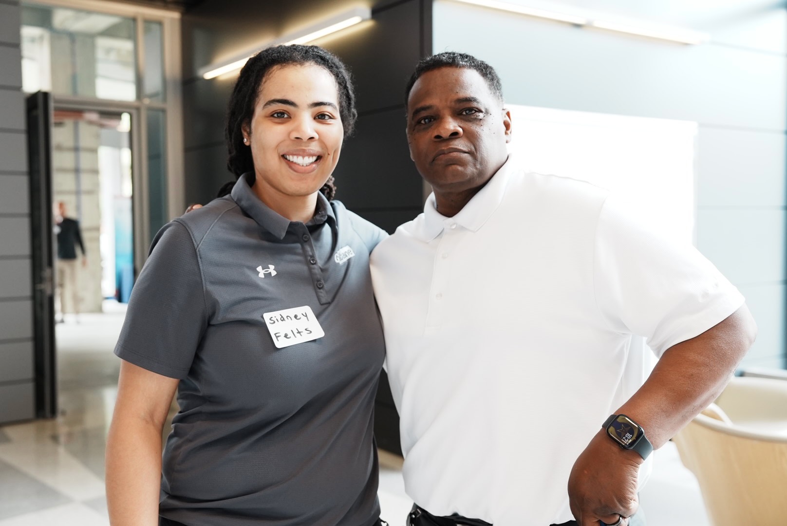 Two contractor representatives during the outreach event