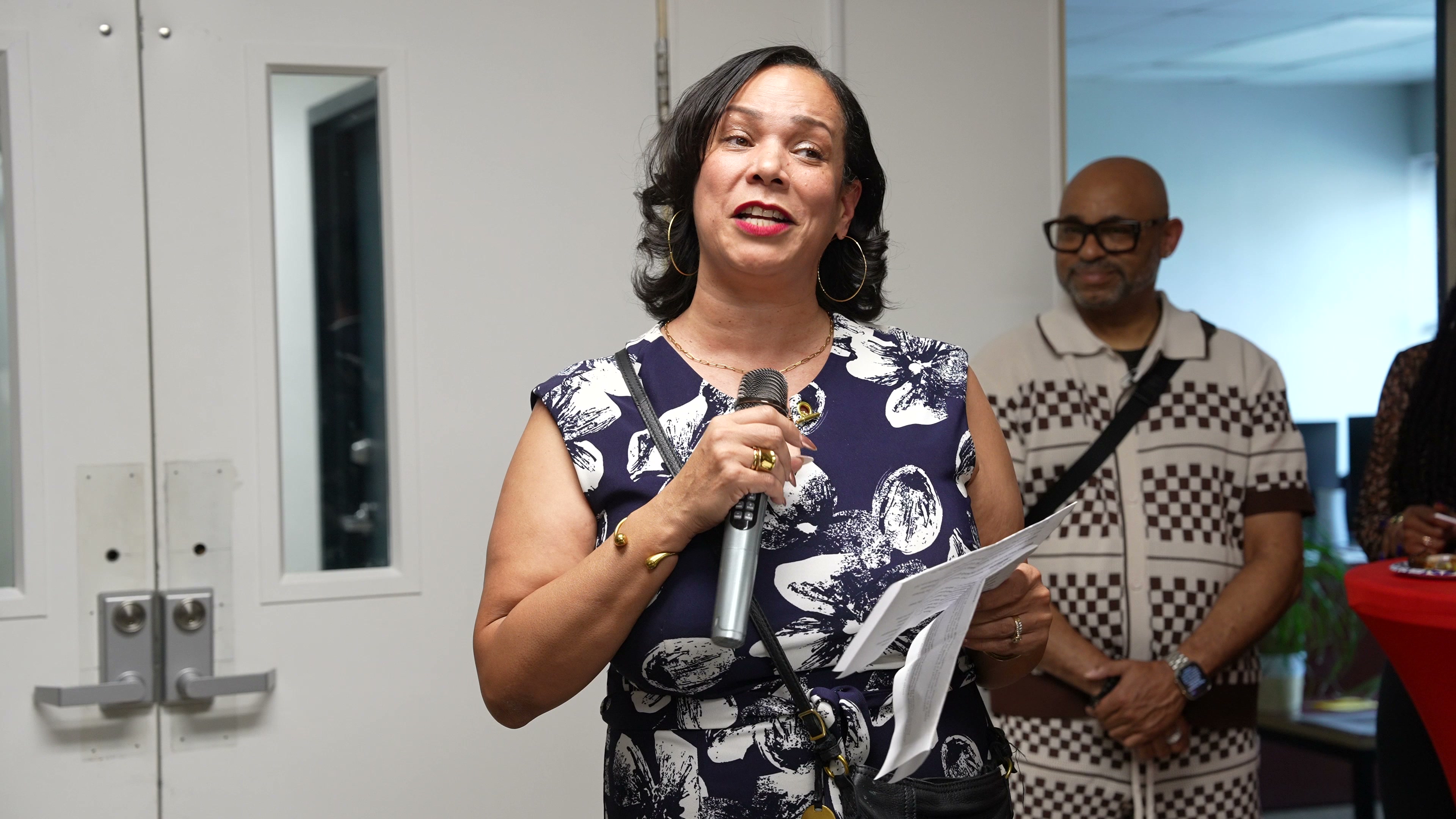 Director Candy Dennis speaking at the C. Alan opening ceremony
